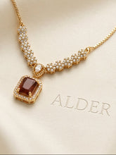 Alder Imperial Diamond Statement Necklace on marble display