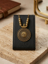 Soleil Sapphire Drop Necklace on cream fabric with ALDER watermark